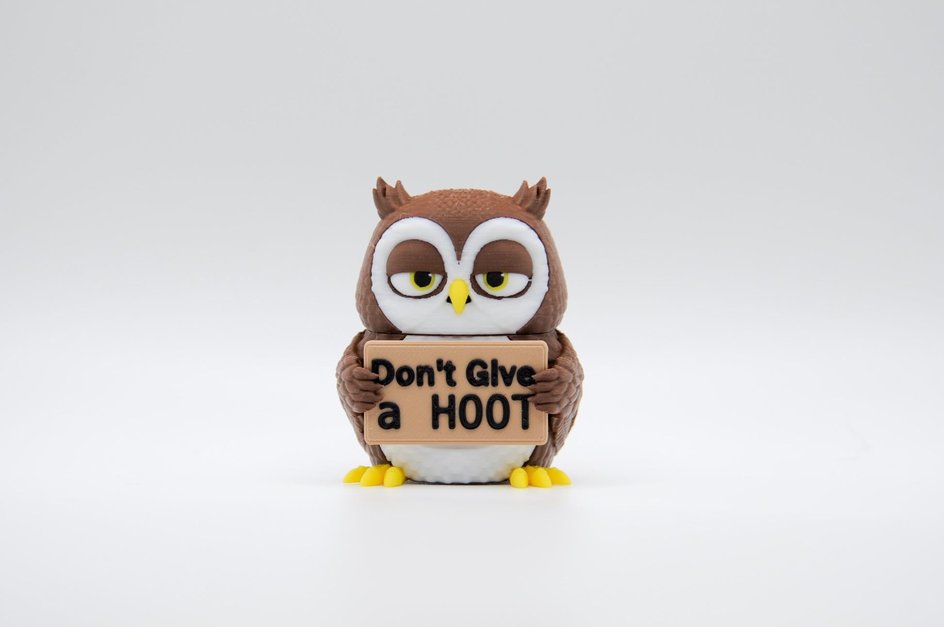 Brown owl AWA sign reading Don't Give a Hoot