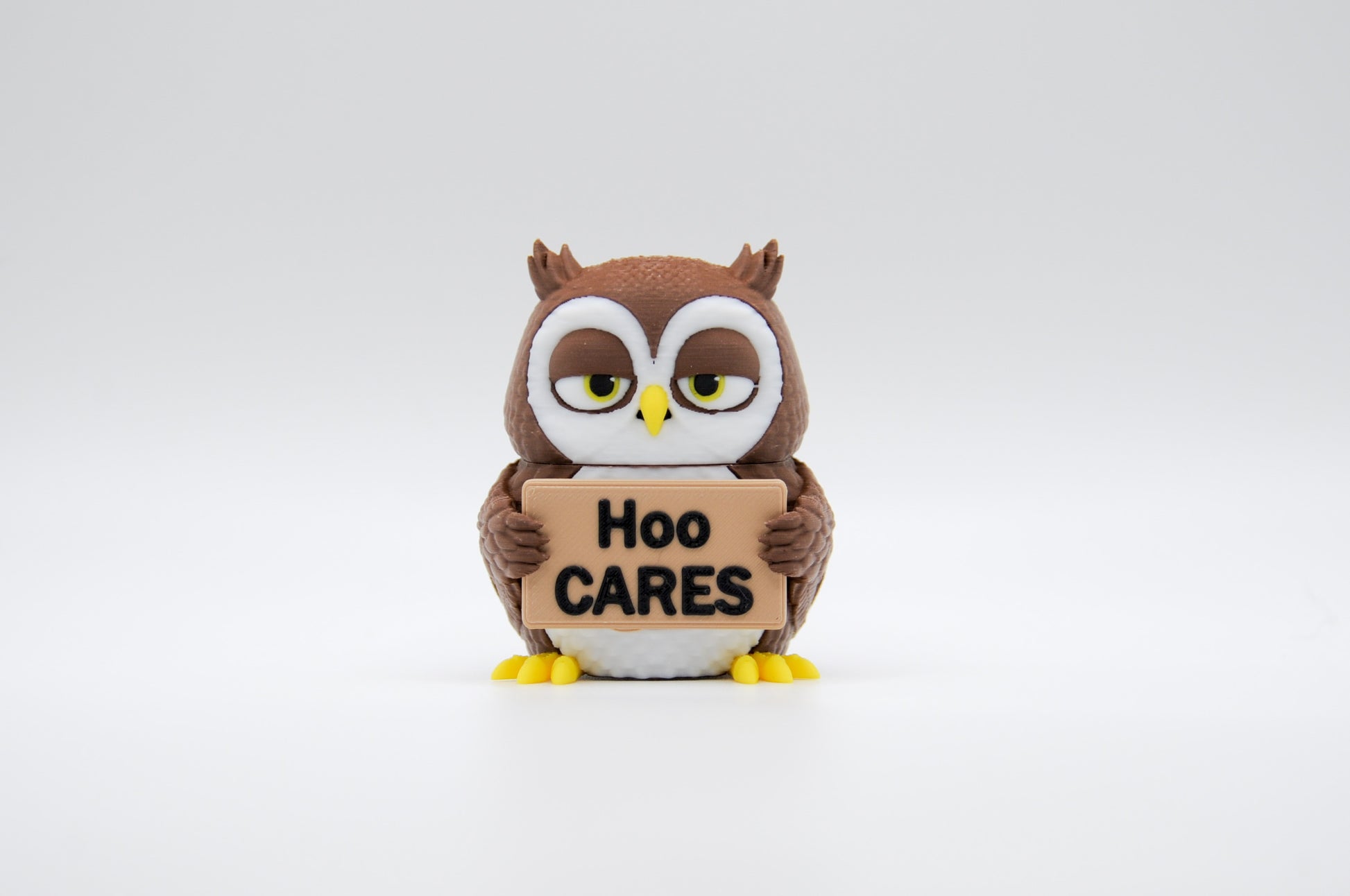 Brown owl AWA sign reading Hoo Cares