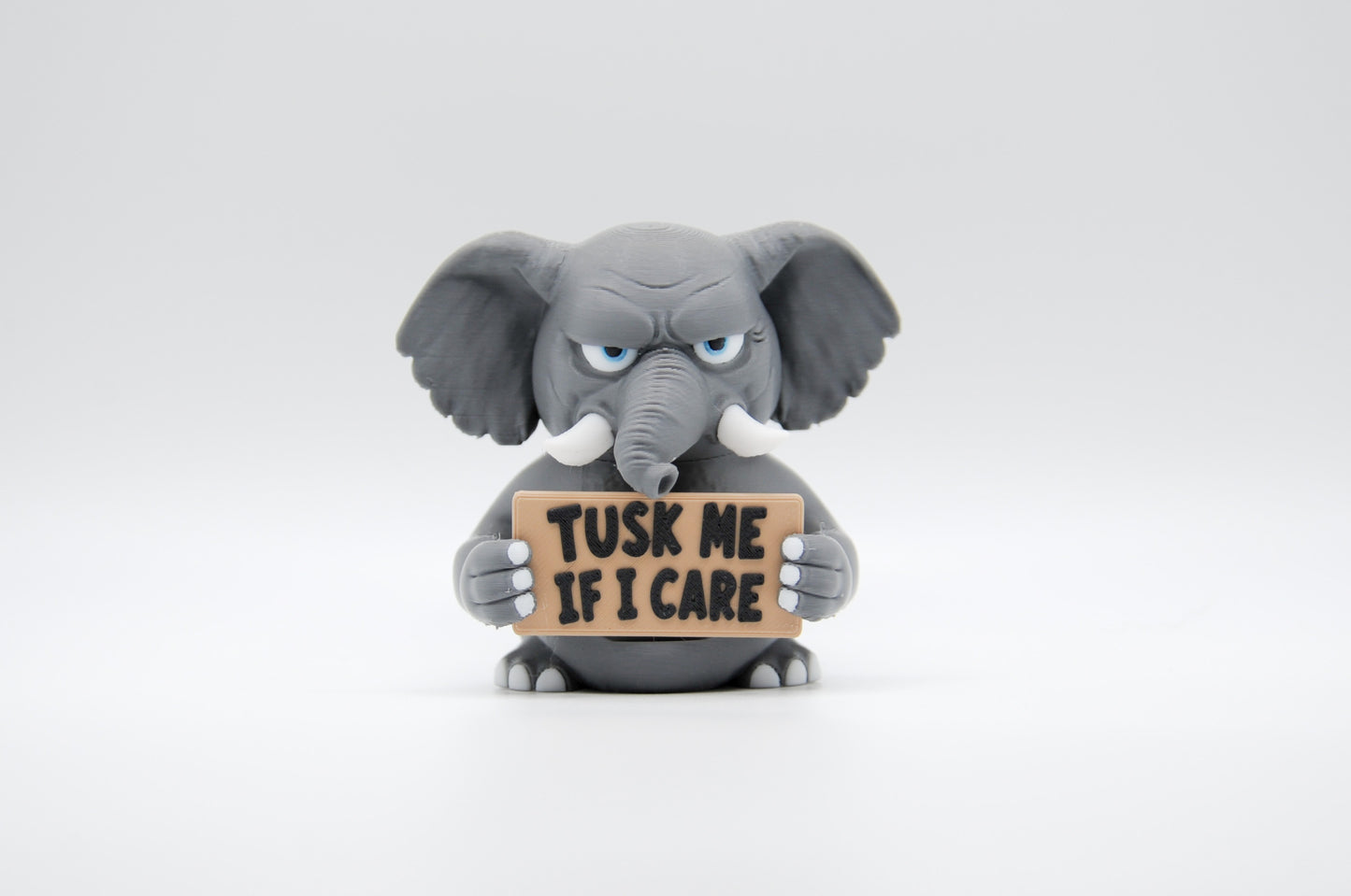 Elephant AWA sign reading Tusk Me If I Care