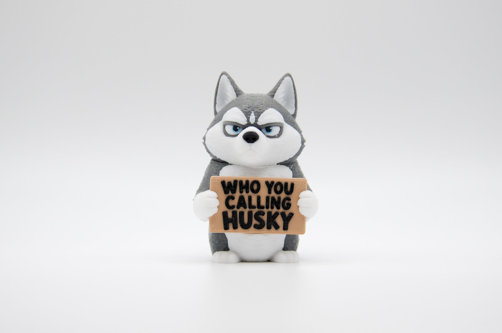 Husky AWA sign reading Who You Calling Husky