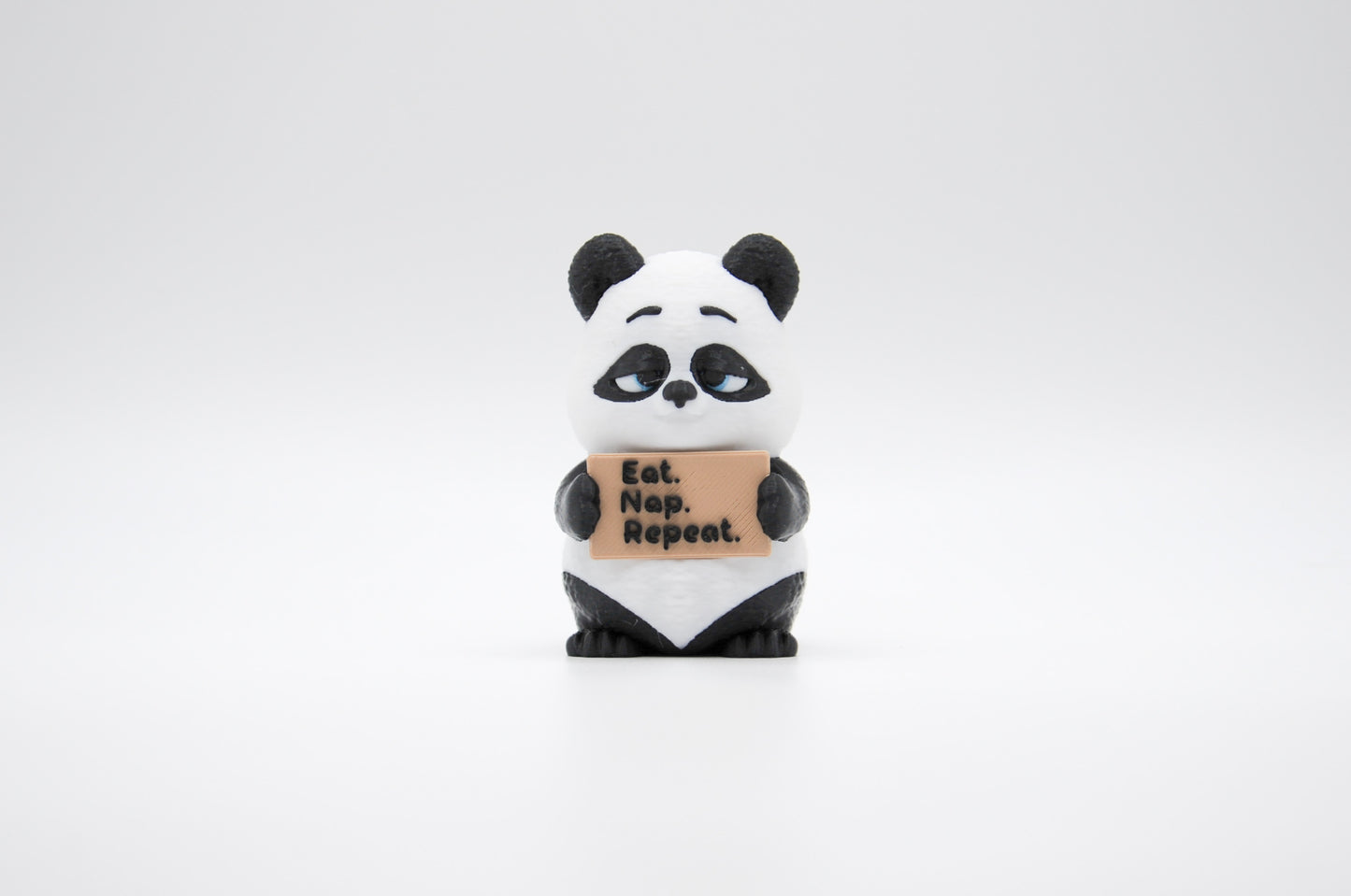 Panda AWA sign reading Eat Nap Repeat