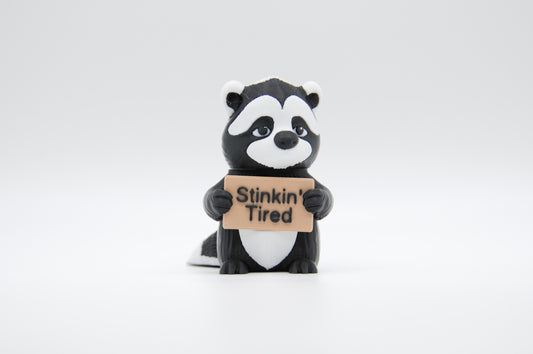 Skunk Animals with Attitude sign reading Stinkin' Tired